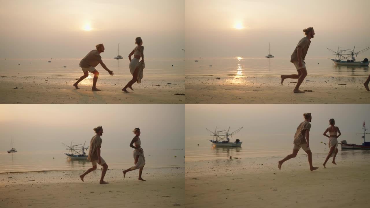 在海滩上奔跑的顽皮夫妇