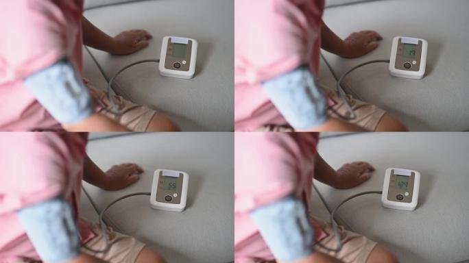 亚洲华裔高级成年男子检查血压监测