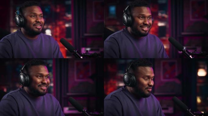 英俊的年轻非洲裔美国男子在阁楼公寓录制广播节目时对着麦克风说话。快乐的黑人男性在镜头前交谈，并在社交