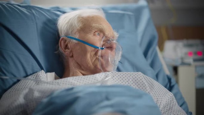 医院病房: 老人戴氧气面罩躺在床上休息，病后完全康复，手术成功。老人回忆自己的家人，朋友，幸福长寿