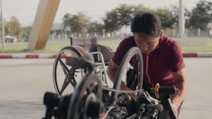 亚洲男子残疾运动员准备手自行车进行训练
