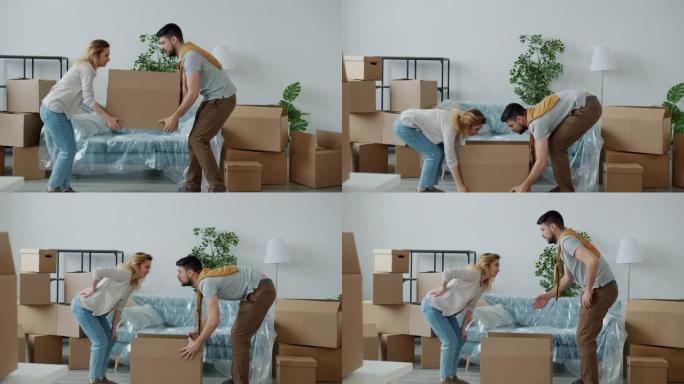 男人和女人背着沉重的箱子去新房子，背痛感觉不好