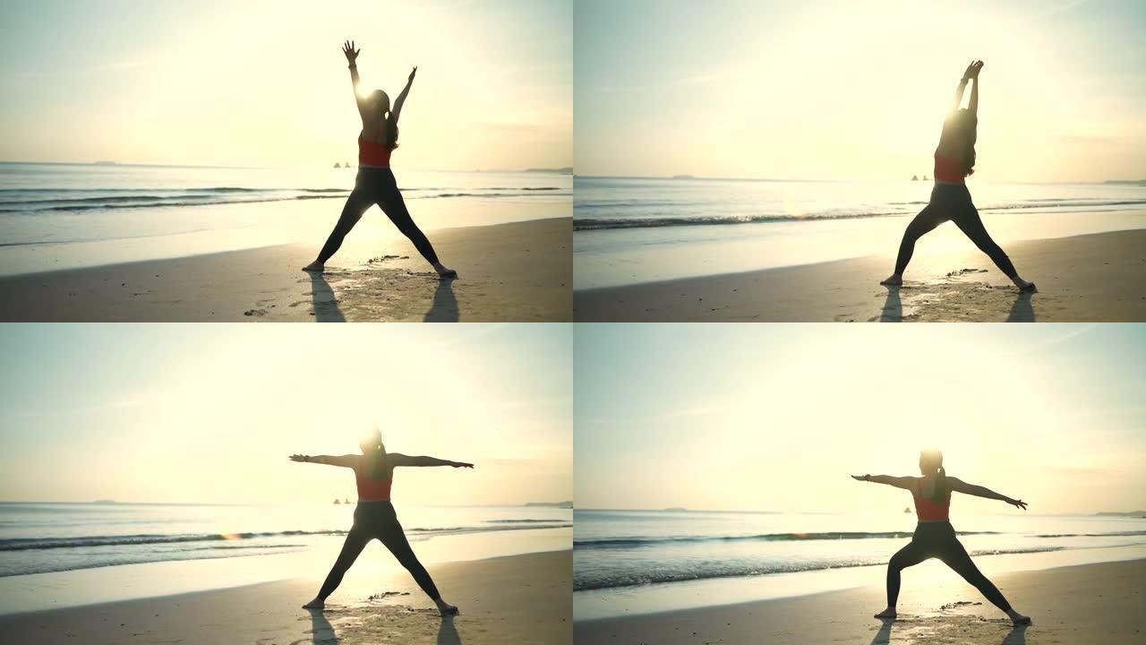 海滩上的运动女性瑜伽