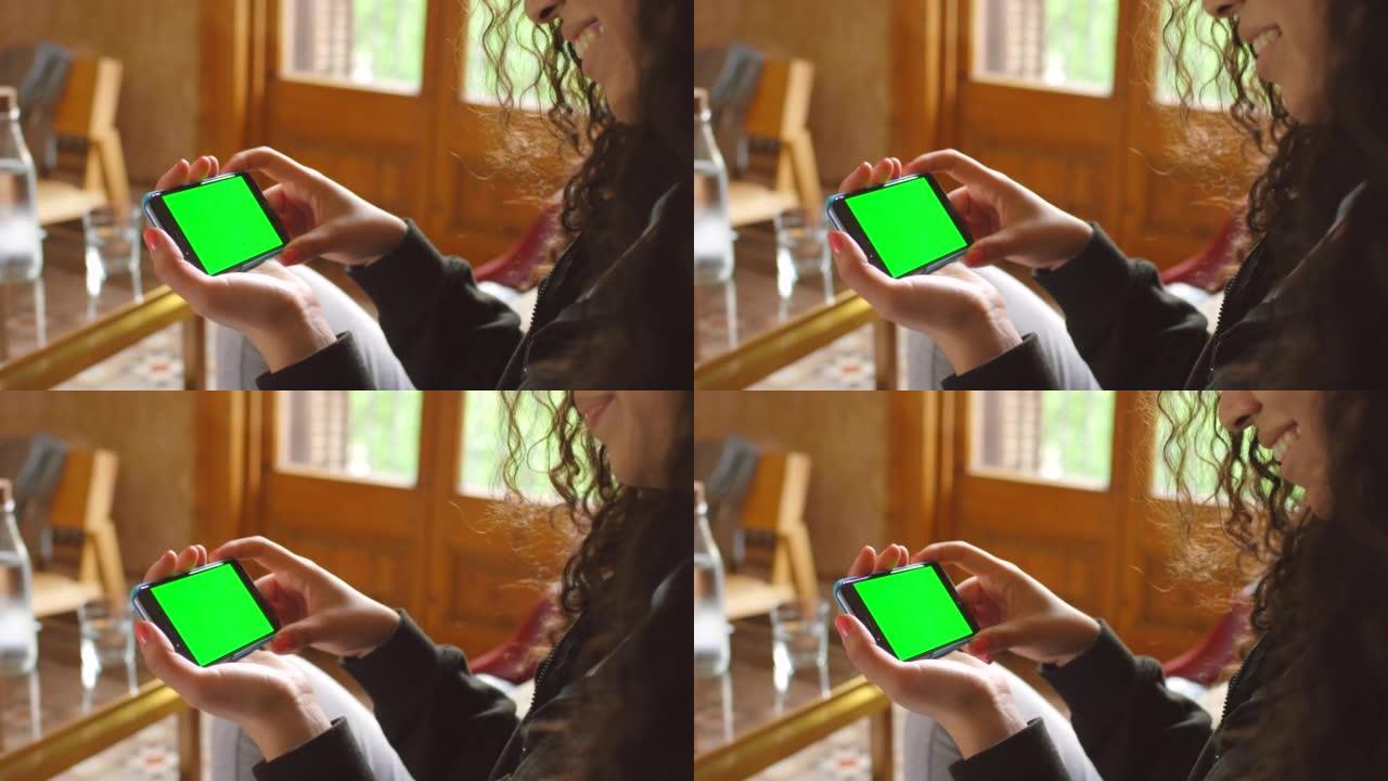 一名年轻女子使用智能手机的4k视频片段