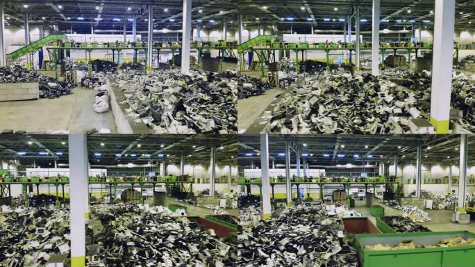 堆满垃圾的大型回收中心。垃圾、电子垃圾回收厂。