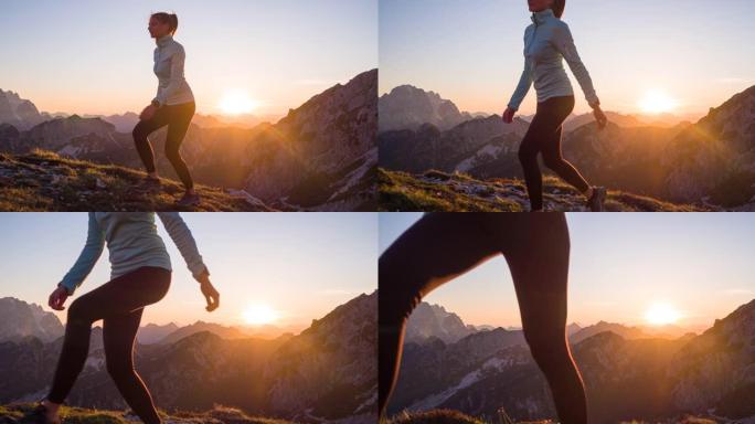 健康的女运动员保持健康的生活方式，日落时在岩石小径和草坡上徒步旅行
