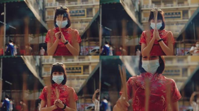 寺庙里戴面具的中国妇女