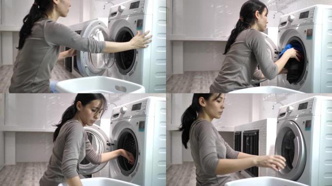 女人在家洗衣服洗衣服家务活滚筒洗衣机