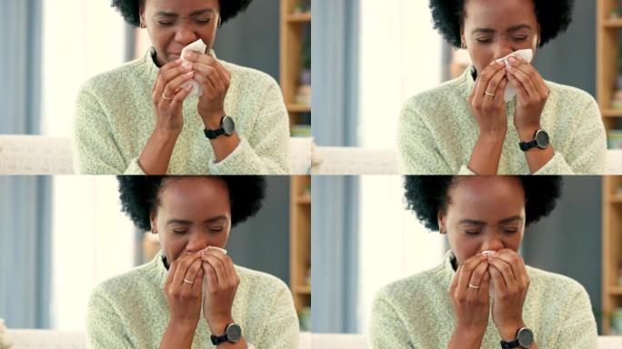 生病的女人独自在里面禁闭时用纸巾鞠躬鼻子。一名患病的非洲妇女从感冒或流感中恢复过来的脸，坐在家里检疫