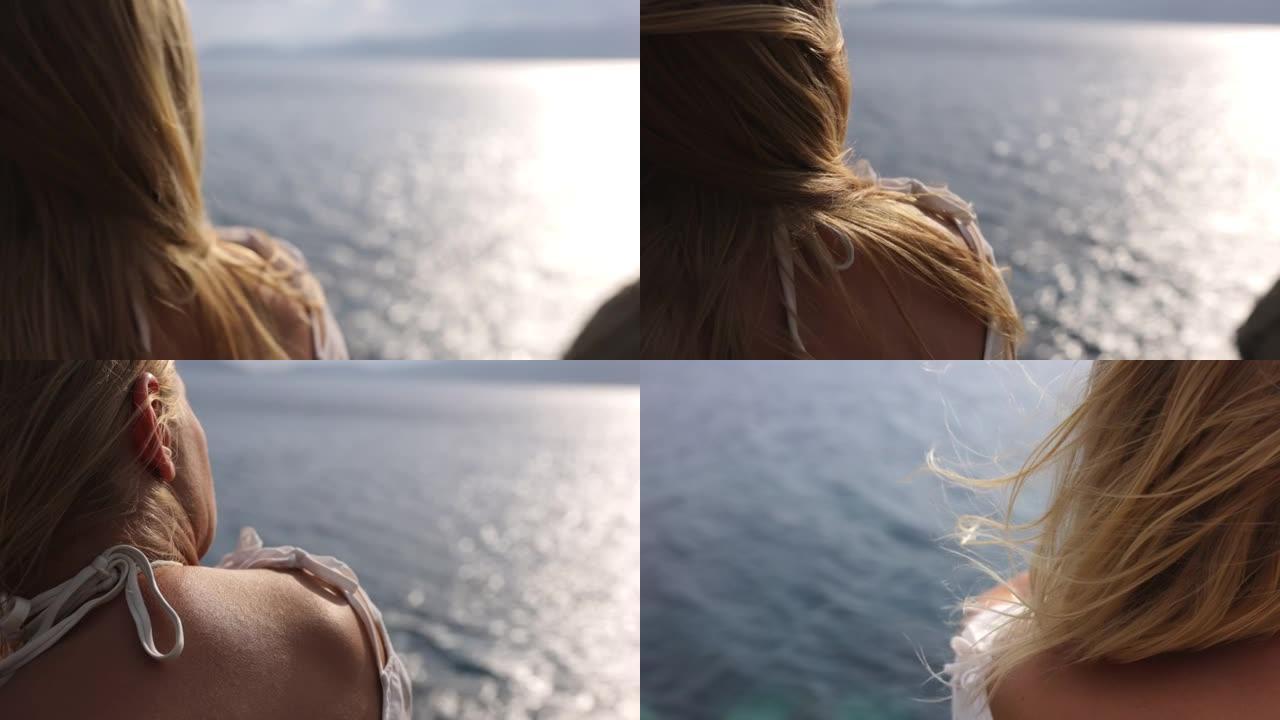 意大利沿海一个金发女孩的特写慢动作视图。