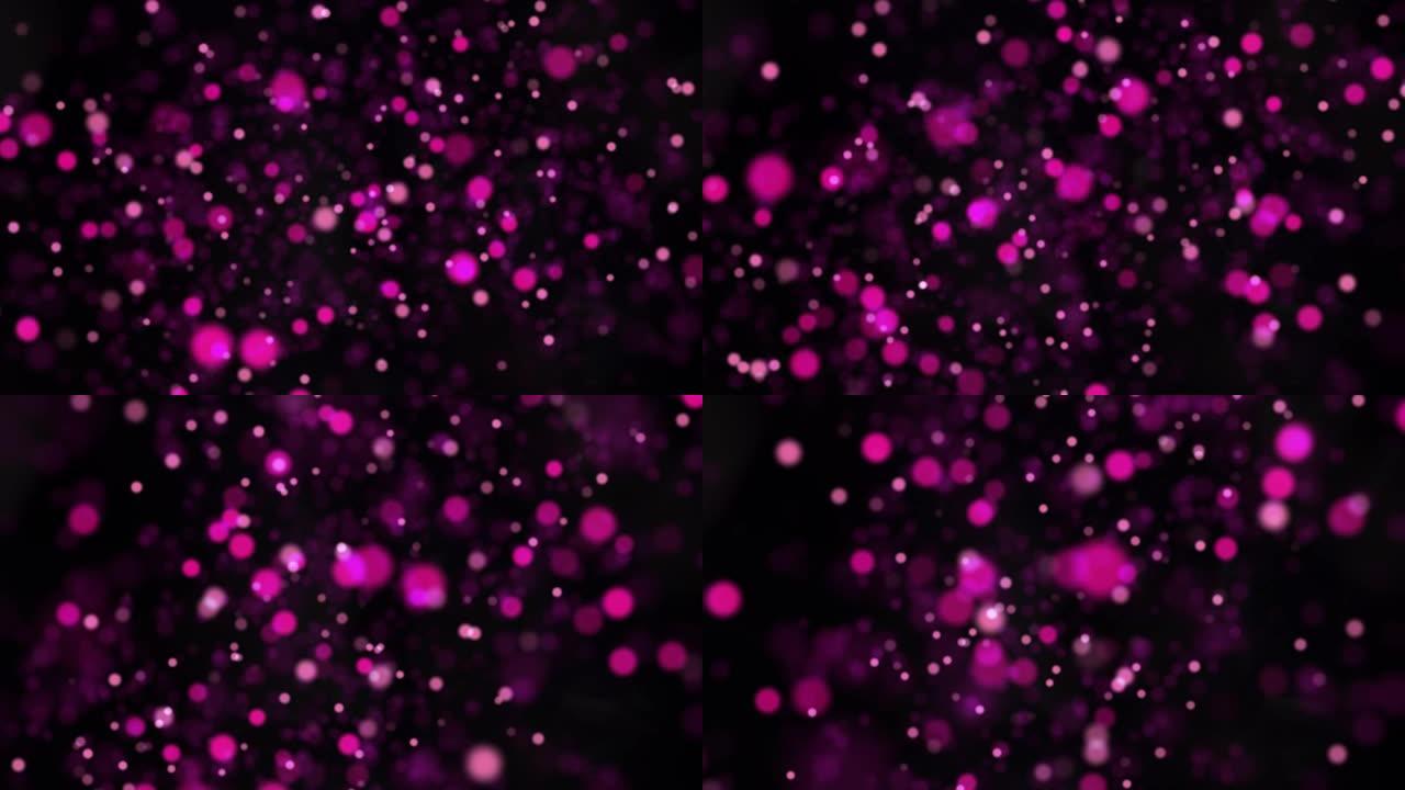 紫色和粉红色的Bokeh粒子球体背景