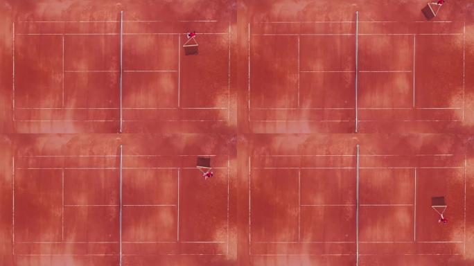 网球运动员在俯视图中沿着球场进行球网