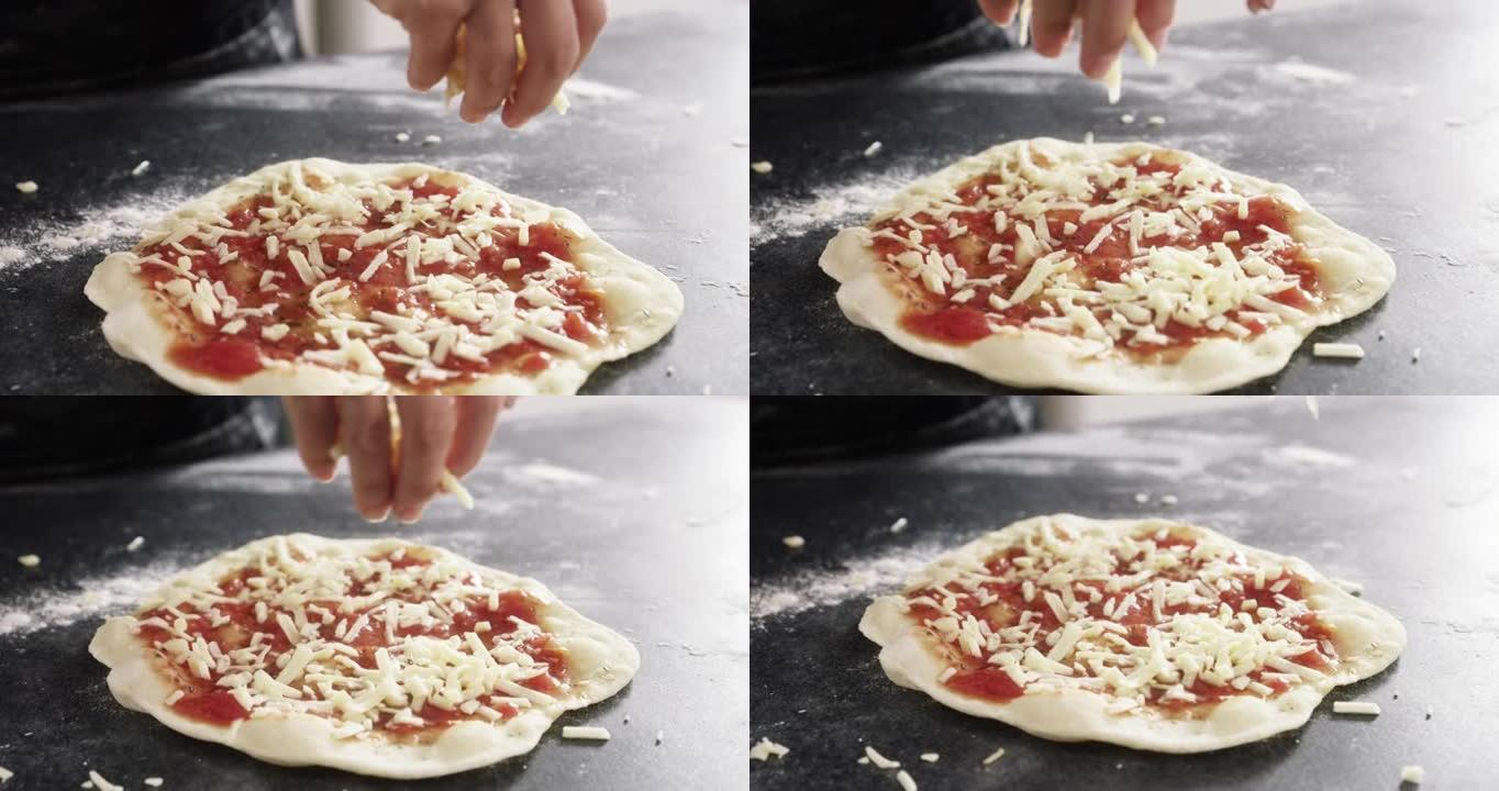 4k视频片段，一个无法辨认的女人在家里做披萨