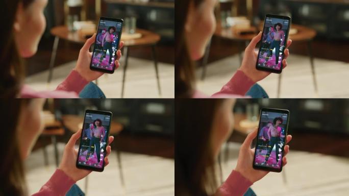 POV镜头: 使用社交媒体应用程序手持智能手机的人，观看时尚的多种族夫妇跳舞的现场视频。社交媒体移动