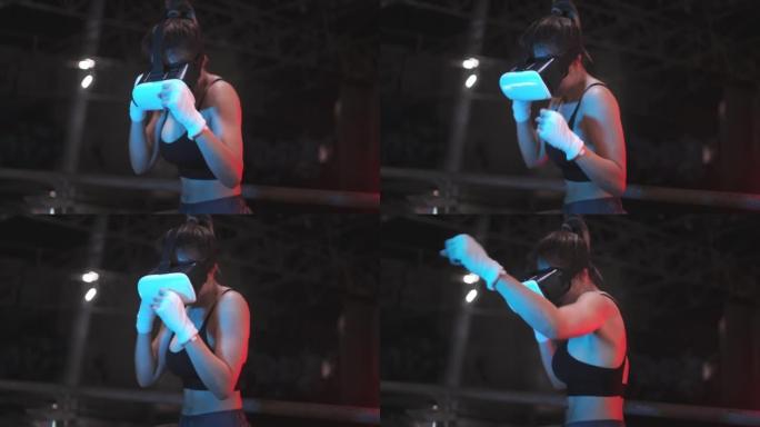 亚洲运动女运动员运动训练训练拳击与虚拟现实玻璃在废弃的黑暗健身房