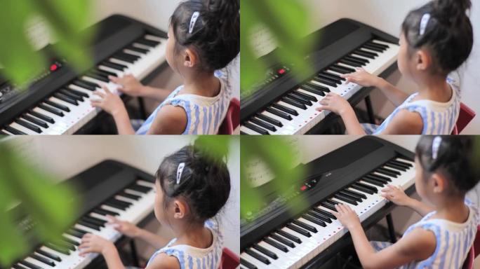 日本孩子在家练琴日本孩子在家练琴钢琴