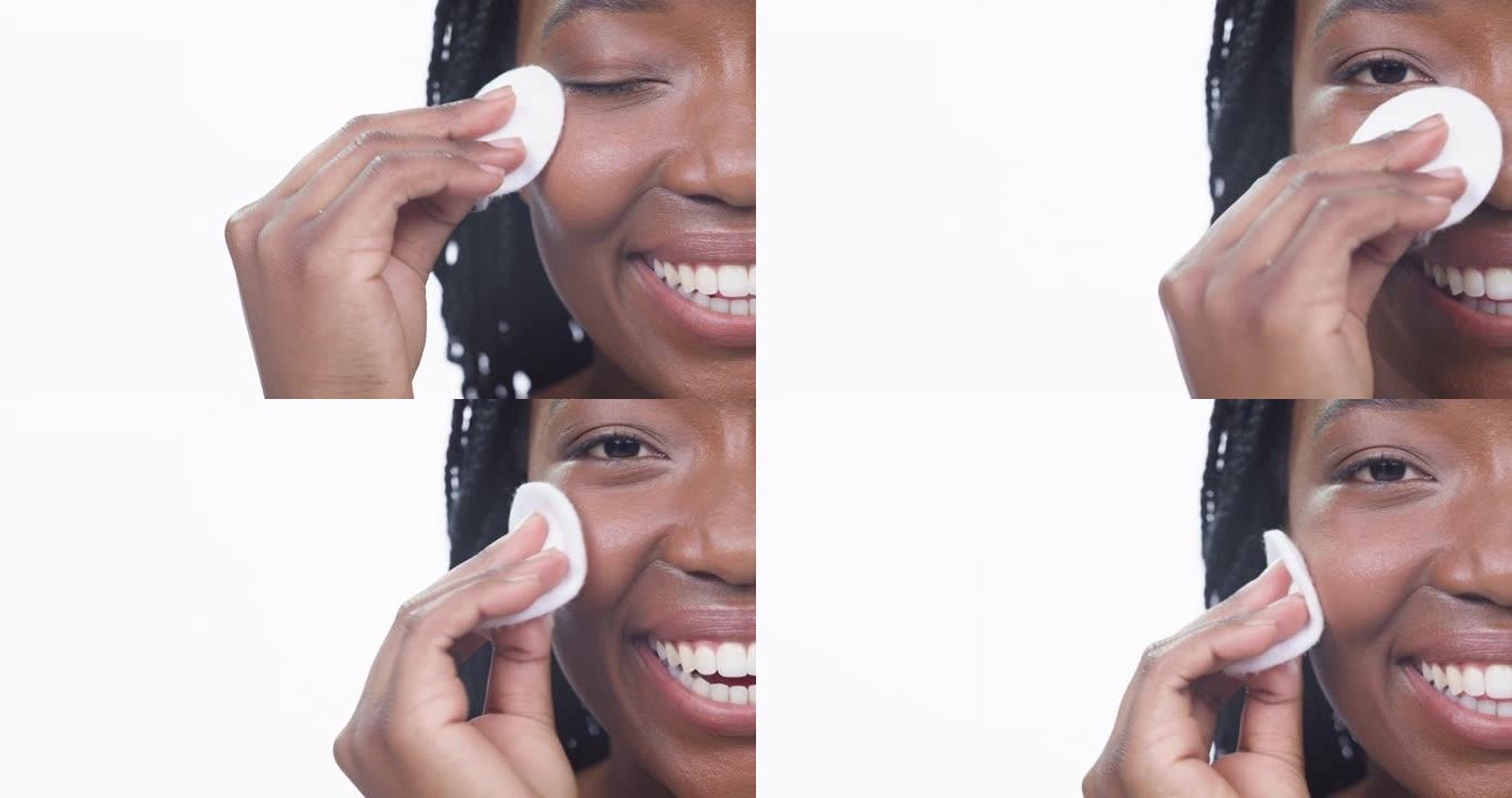 一名年轻美女用棉垫清洁脸部的4k视频片段