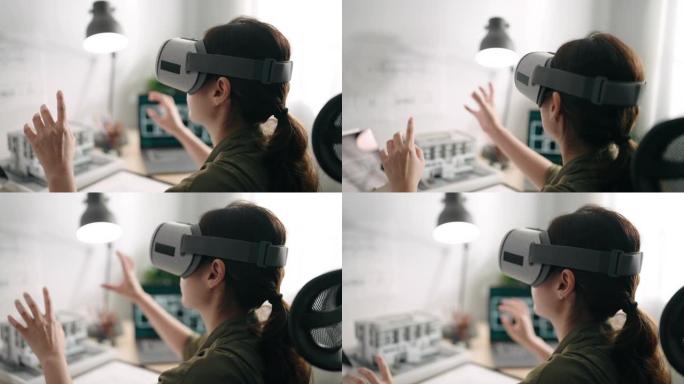 亚洲女商人在办公室的办公桌上使用VR眼镜进行建筑师工作