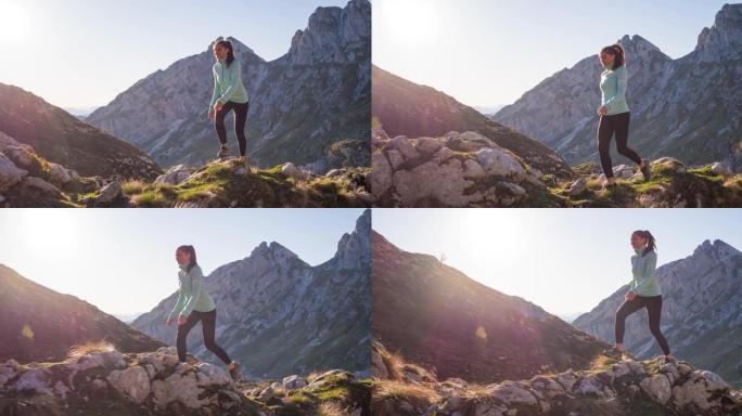 有身体意识的女运动员在山区自然户外徒步旅行