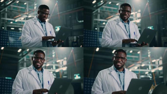 微笑工程师从事人造卫星建设的肖像。航空航天局: 非裔美国科学家使用平板电脑开发用于太空探索的航天器。