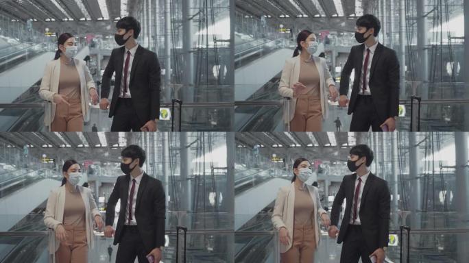 一个亚洲商人和一个女人在机场