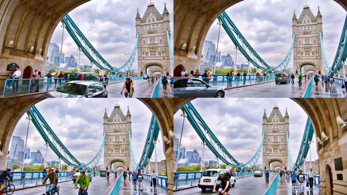 伦敦的塔桥。骑自行车的人，汽车，行人享受一天