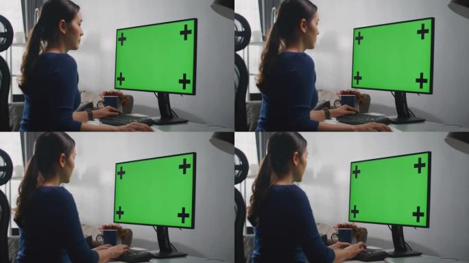 女人在家使用电脑绿屏