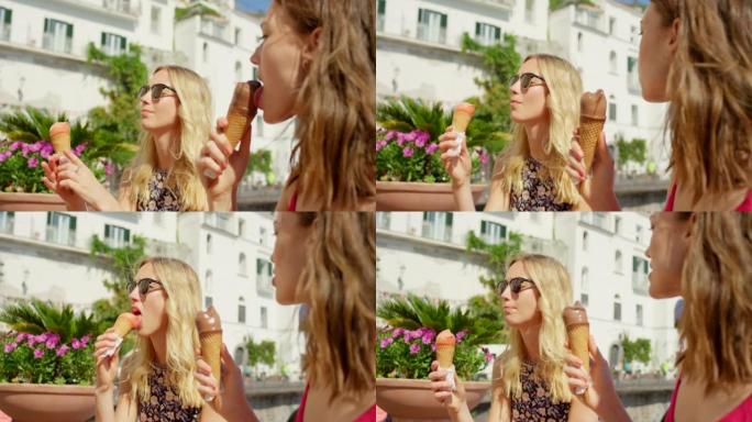 4k视频片段，两名年轻女性在夏日探索意大利时吃冰淇淋
