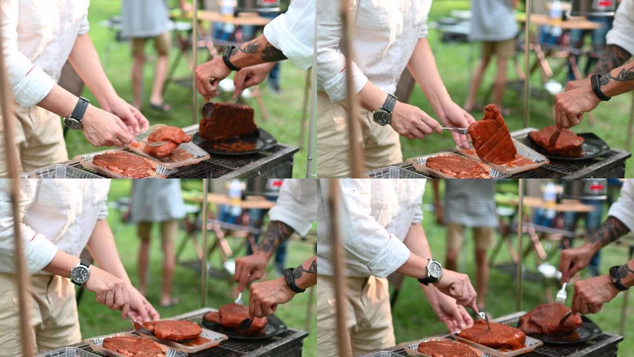 亚洲中国成熟夫妇的手在野营时为烧烤烧烤腌制调味肉