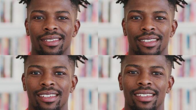 非洲人，微笑和幸福，一边露出洁白的牙齿，一边站在南非的大学图书馆里。生活中拥有快乐和积极心态的男学生