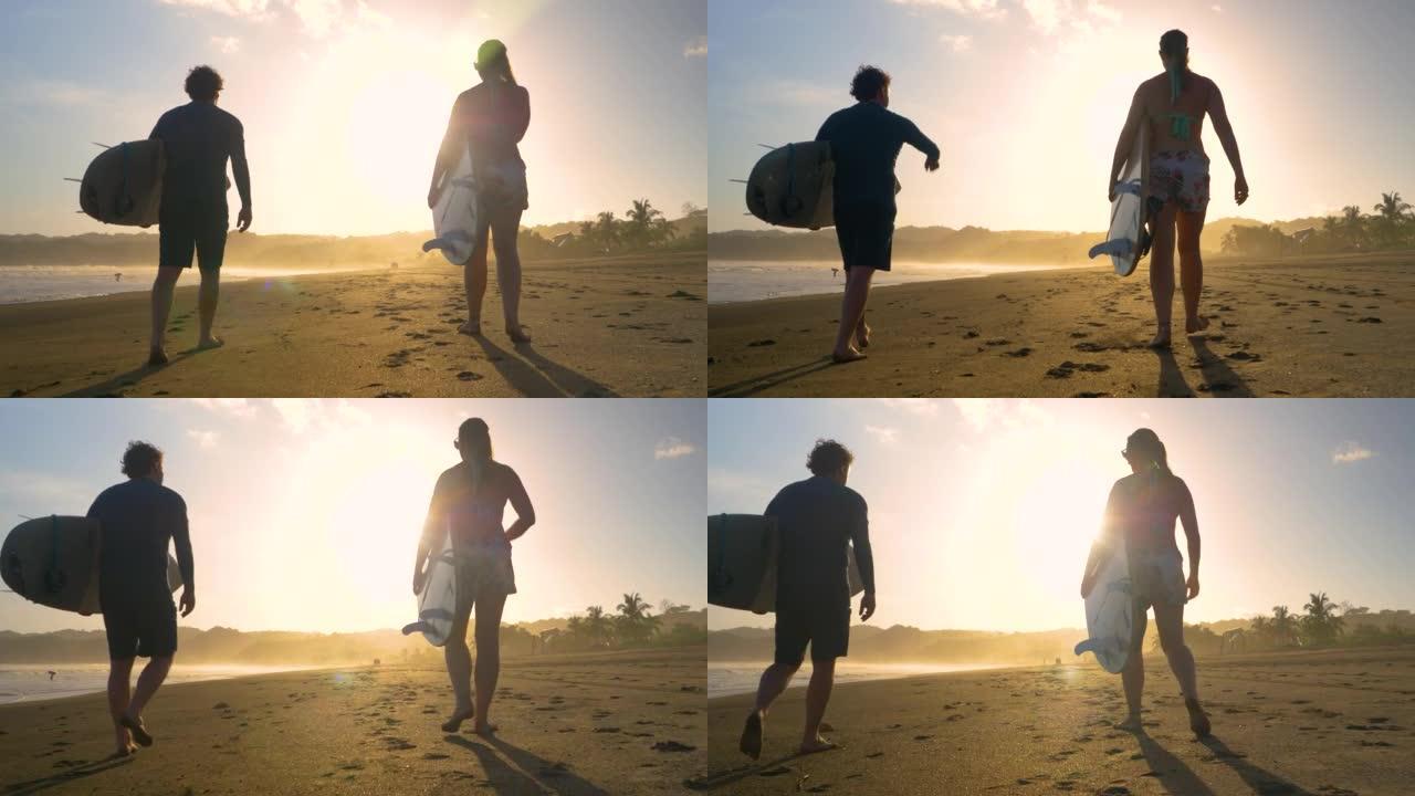 慢动作，低角度视图: 跟随冲浪者带着冲浪板在海滩上行走