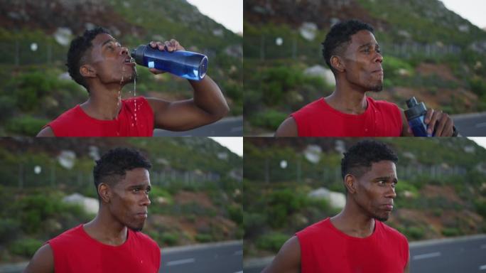 非裔美国男子站在马路上喝水