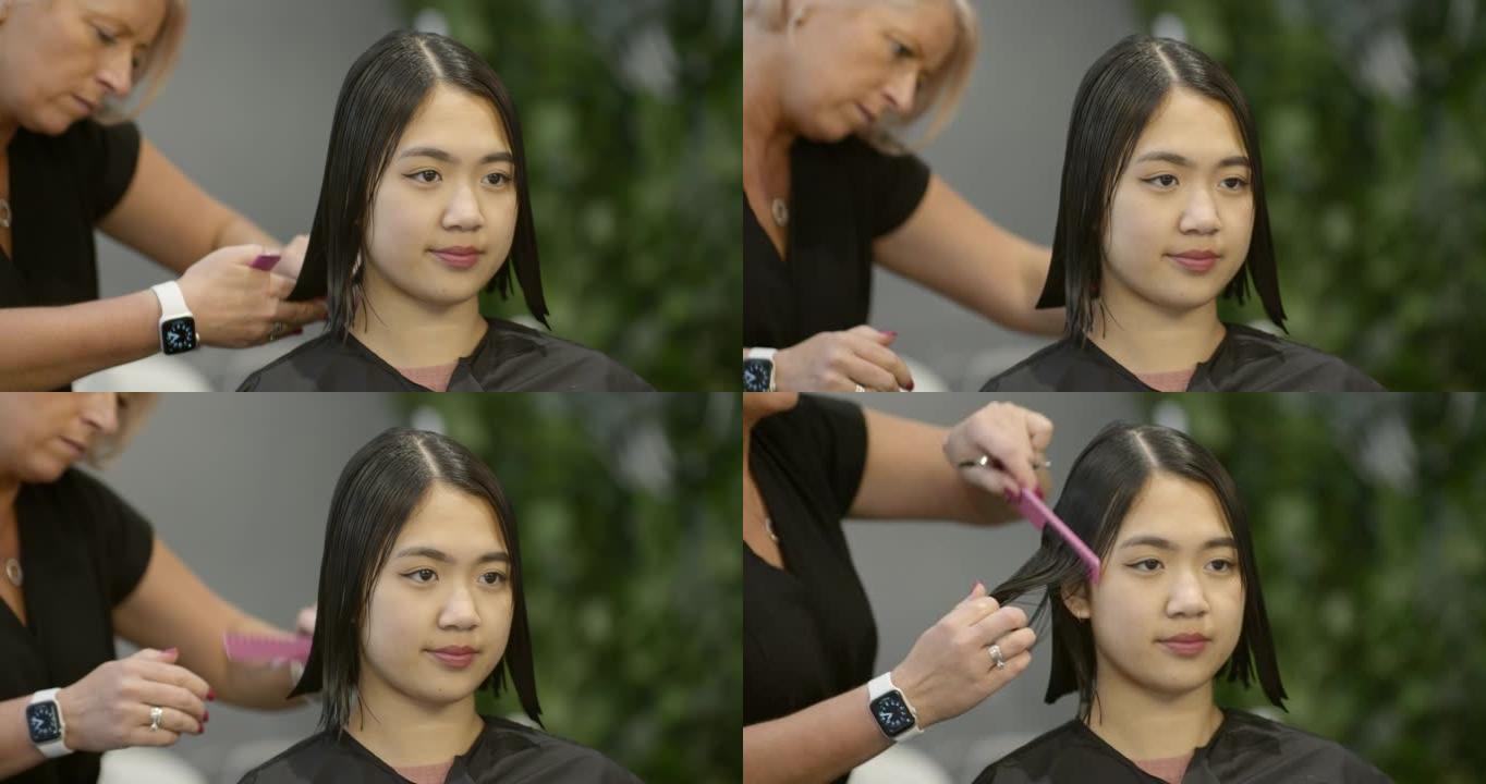 年轻女子剪头发女人打理美女女性发型设计
