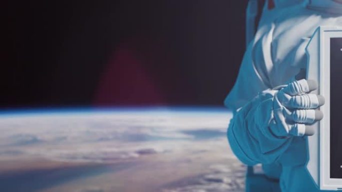 零重力宇航员的特写镜头举着方形标志，并显示出竖起大拇指的手势。
