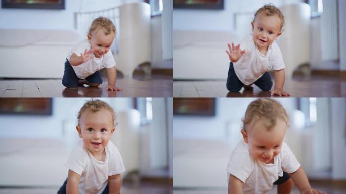 一个可爱的快乐蹒跚学步的小男孩正在家里的木地板上爬行的真实照片