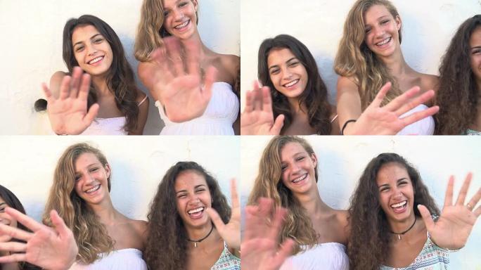 女性青少年朋友在慢动作中向相机挥手