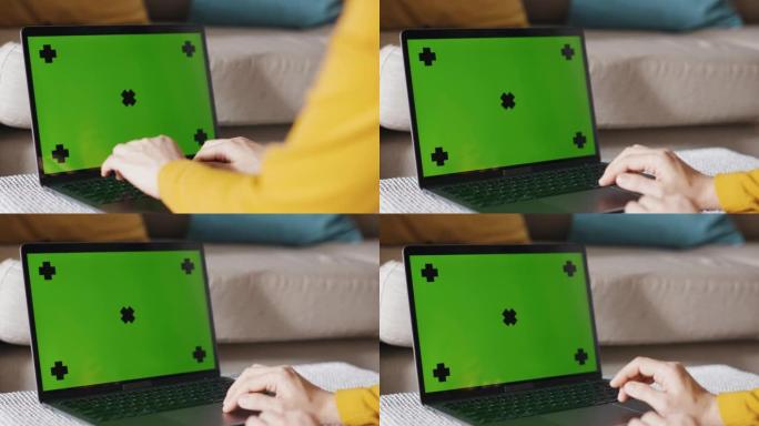 在家工作-笔记本电脑上的色度键绿色屏幕