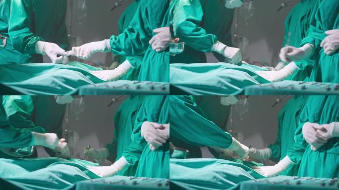 4K UHD手持设备: 关闭外科医生护士准备手术设备，并将其交给手术室的外科医生。医院医疗保健概念。