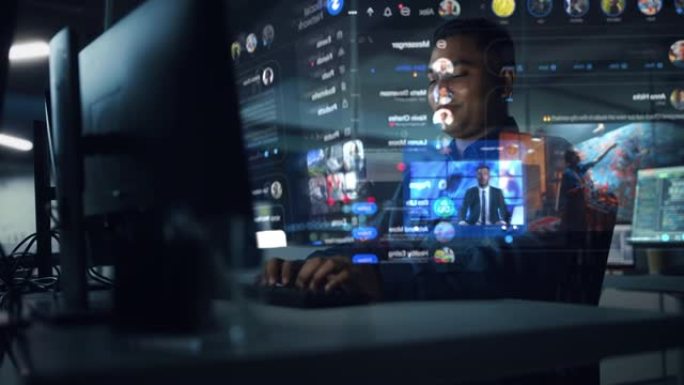 全息图屏幕: 具有创造力的印度男子使用具有全息投影的台式计算机，多个显示器显示网站，视频流服务，社交