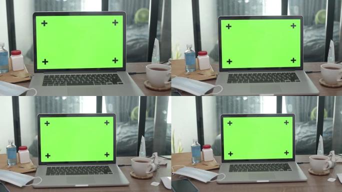 绿屏电脑笔记本电脑的多莉镜头，没有人