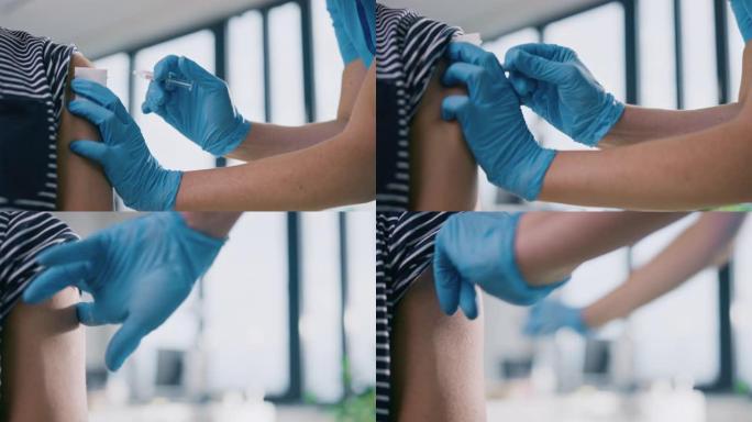 戴着安全手套和防护口罩的医疗护士正在健康诊所向男性患者注射疫苗。医生使用皮下注射针和注射器注射药物作