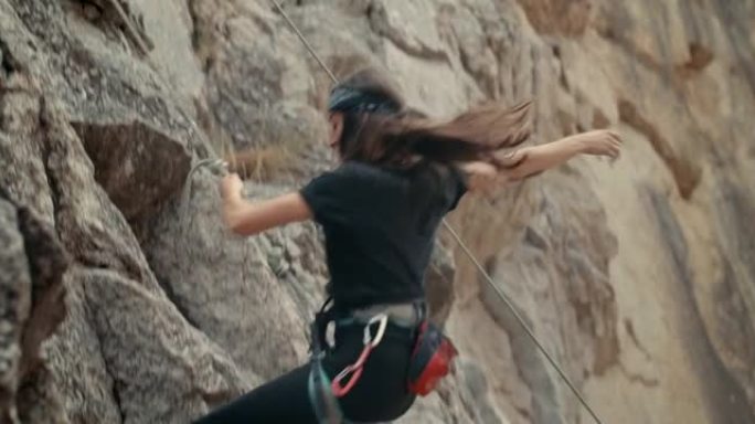 一名年轻女子攀岩的4k录像