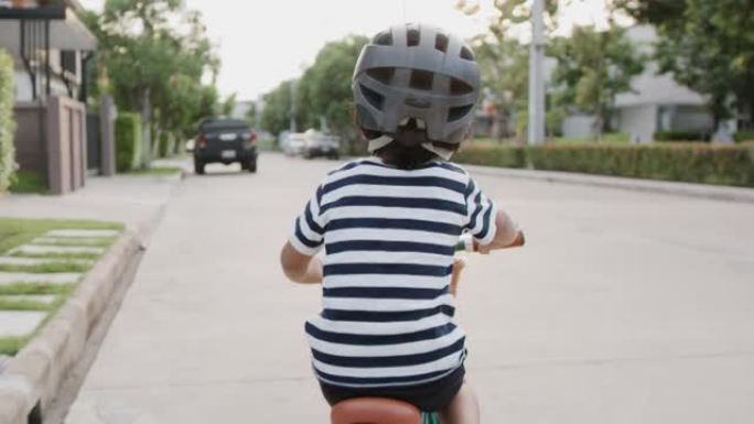 男孩骑自行车。小男孩骑自行车特写视频素材