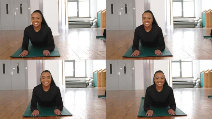 非洲妇女在健身工作室练习瑜伽