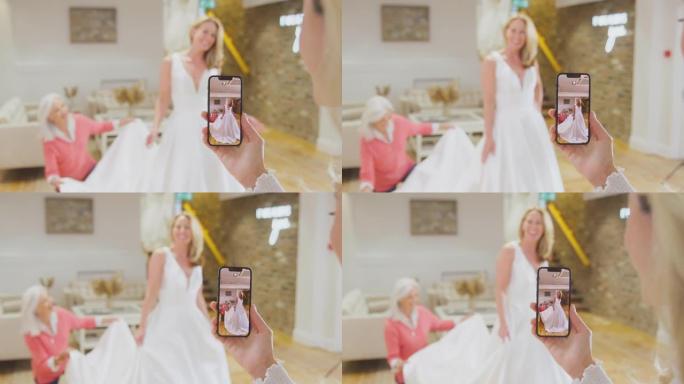 成年女儿在新娘店里拍摄成熟新娘试穿婚纱的照片 -- 慢动作拍摄