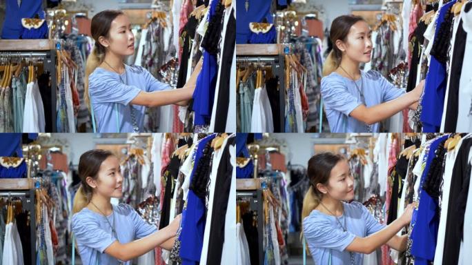 韩国少女在服装店购物