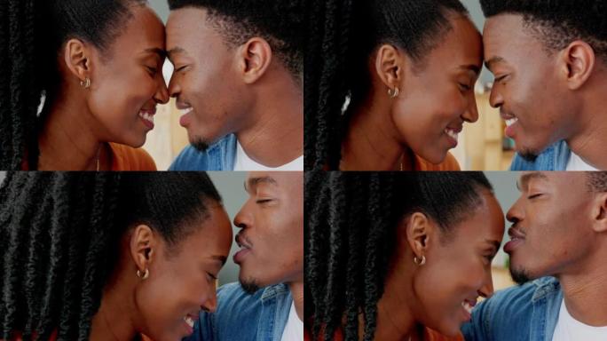 爱情，情侣和亲吻，一对情侣在她的家里用浪漫和感情亲吻，结合和爱。已婚的黑人妇女和快乐的男人在他们的房