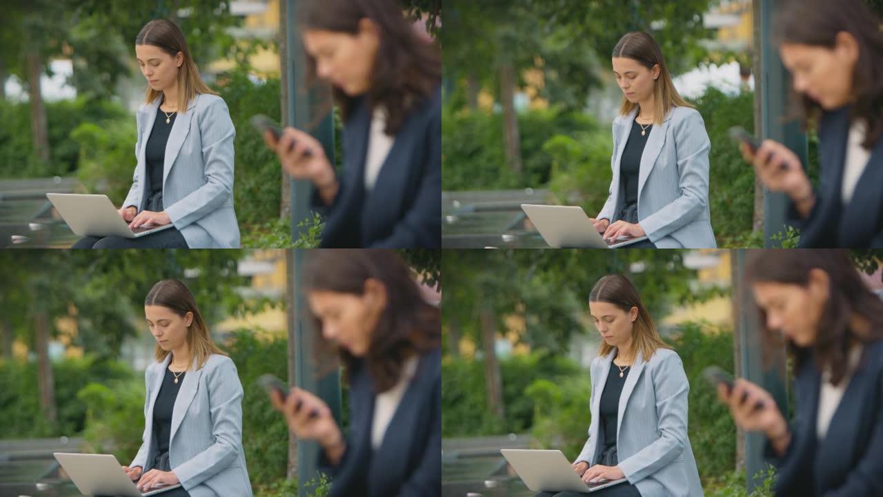 女上班族在户外工作，在办公室休息时使用笔记本电脑和手机