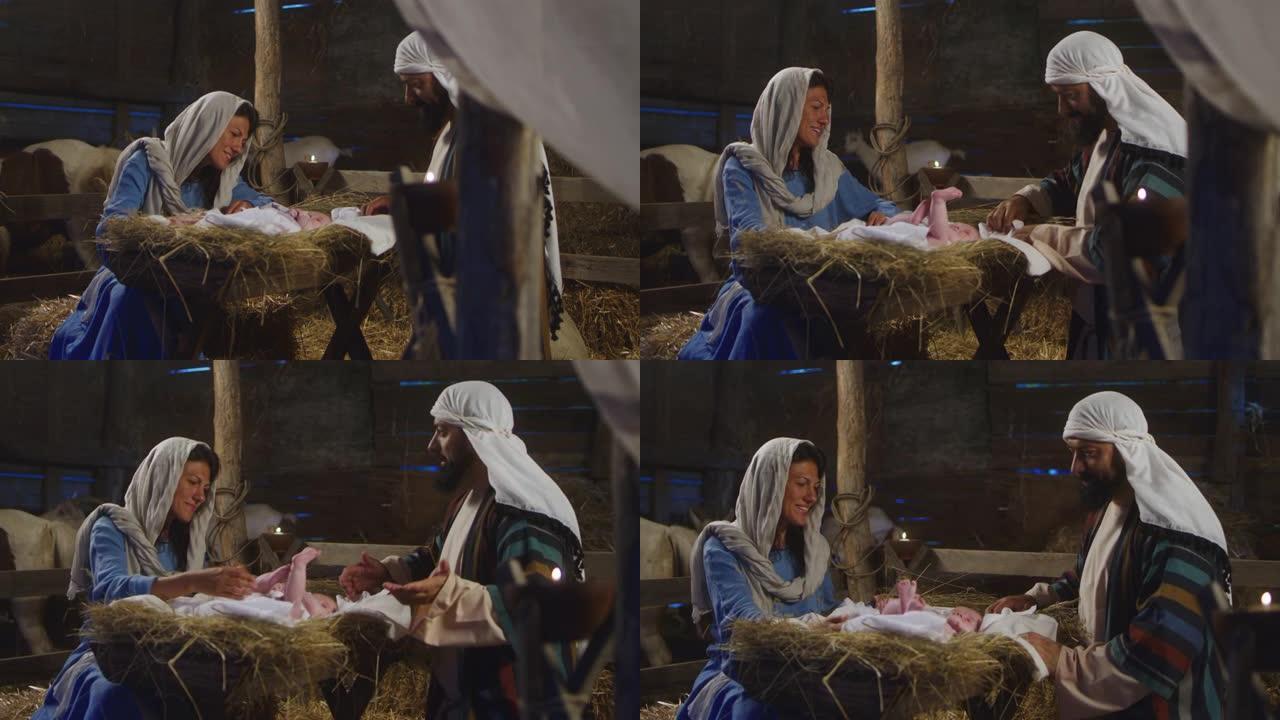 玛丽和约瑟夫带着小耶稣在谷仓里