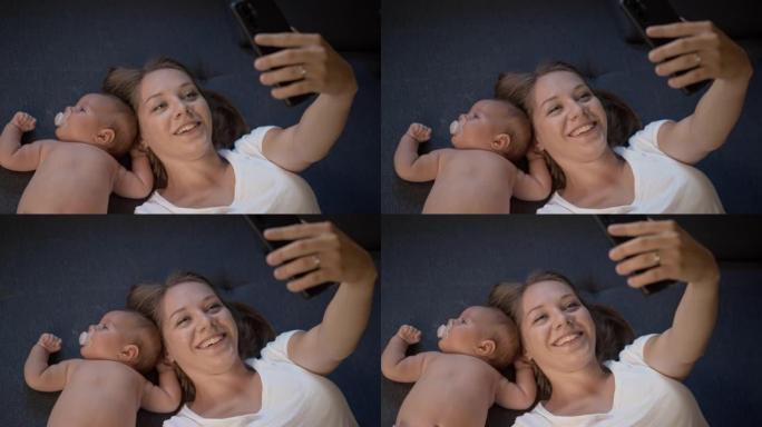 SLO MO年轻的母亲与她的婴儿合影